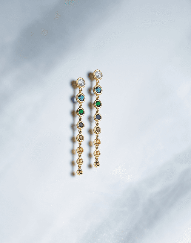 Motek Jewelry multi-color bezel-set gemstone and diamond linear drop earrings in 14k yellow gold.