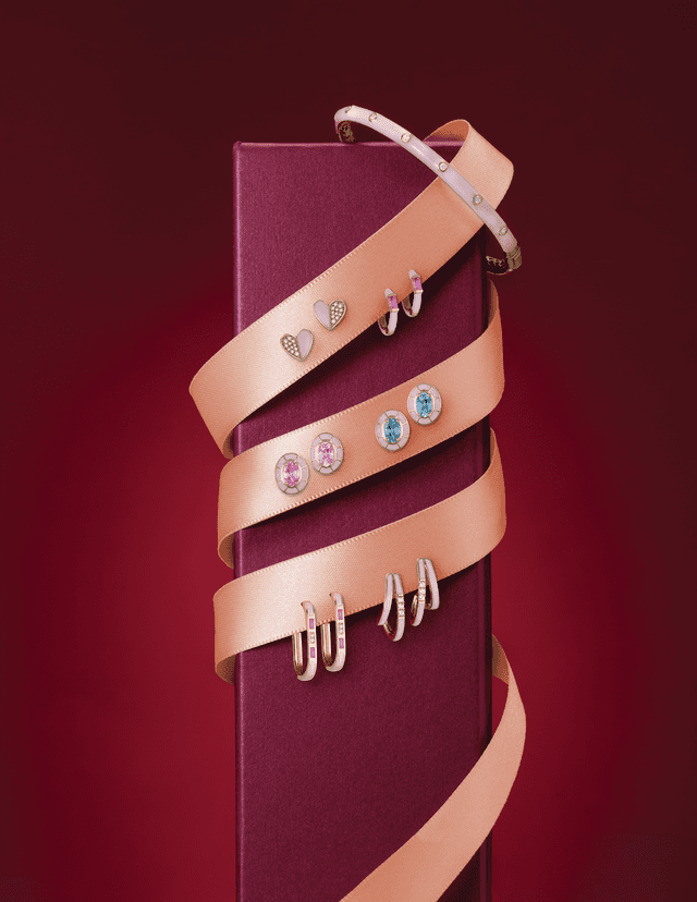 Motek Jewelry gemstone stud earrings and diamond huggie hoops styled on satin ribbon.