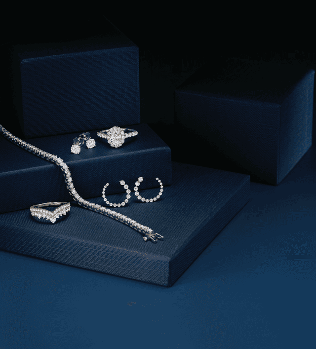 Motek Jewelry bridal collection featuring diamond tennis bracelet, open hoops, and rings